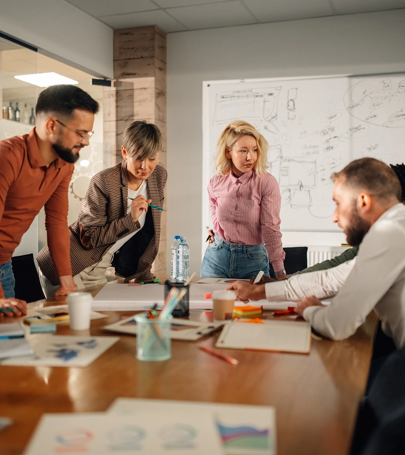 Team collaborating in a modern office setting.