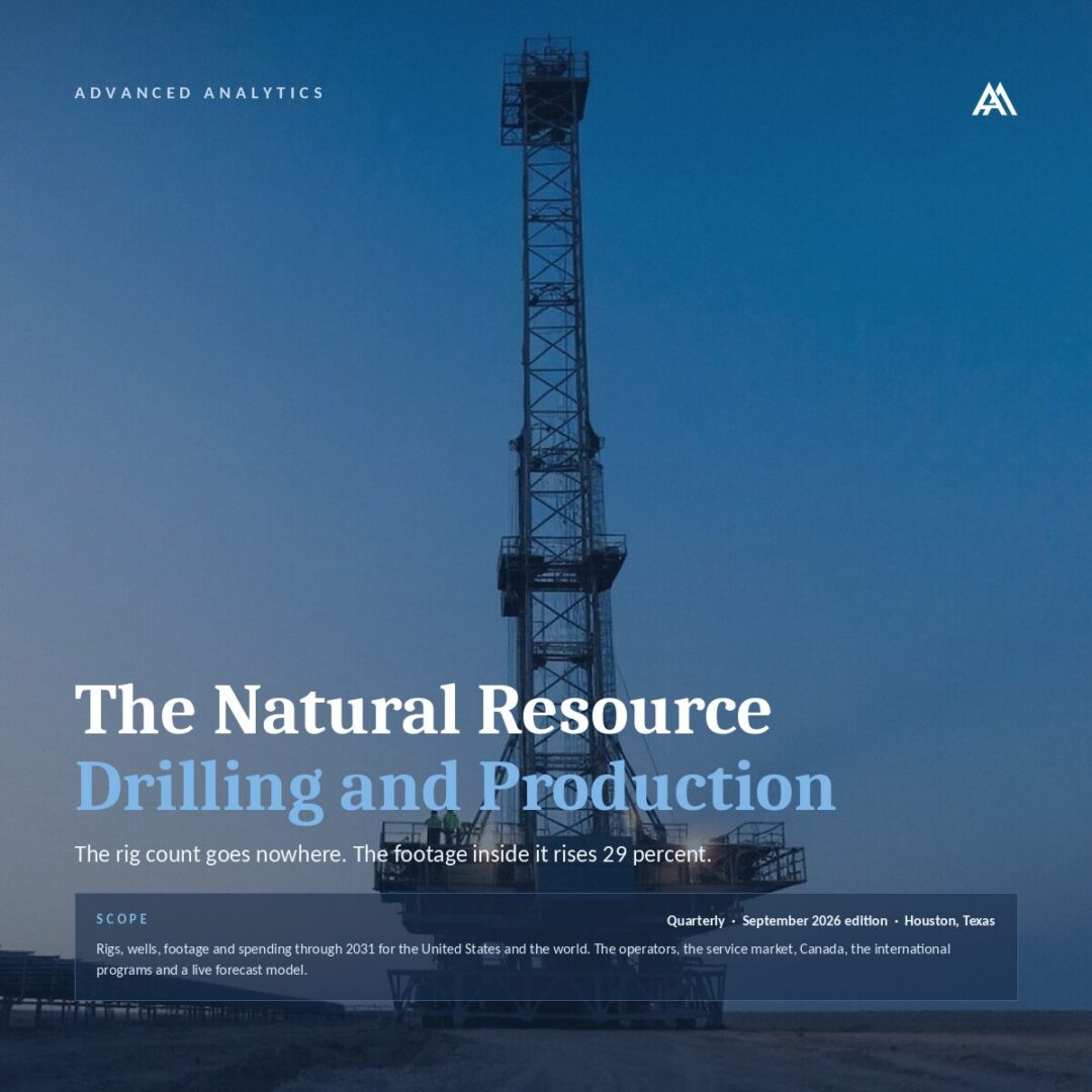 Oil drilling rig against a twilight sky.